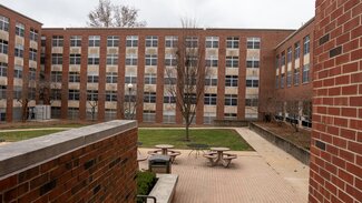 Daniels exterior courtyard with picnic tables and patio