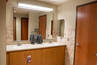 Suite bathroom with two sinks