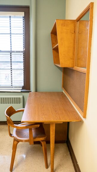 Desk with chair, shelves and window
